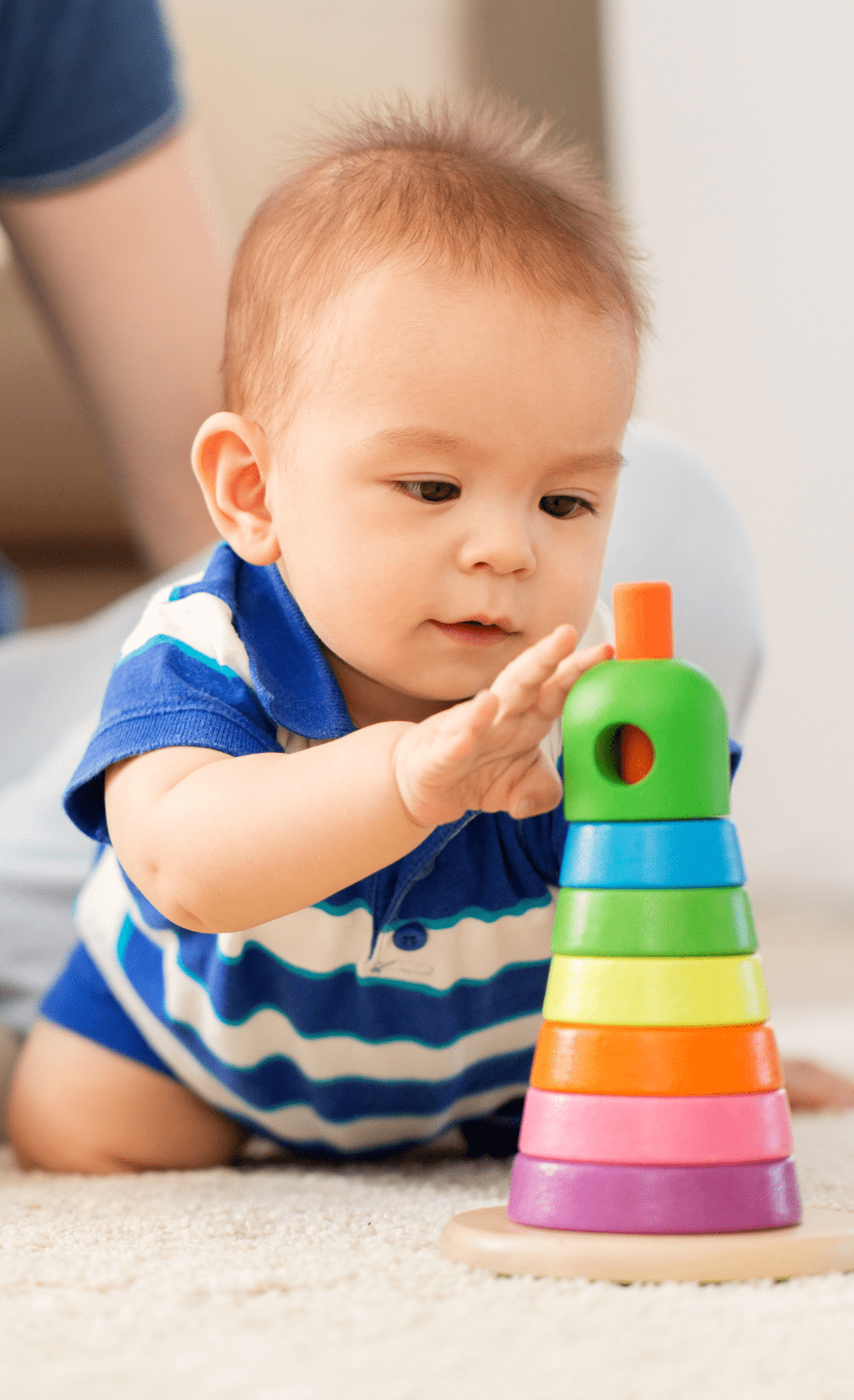 3 kids playing with colorful balls